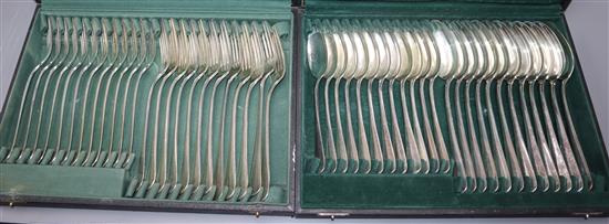 A part canteen of late 19th/early 20th century Dutch 833 white metal flatware, housed in two cases, maker VKB & VK, 81 oz.